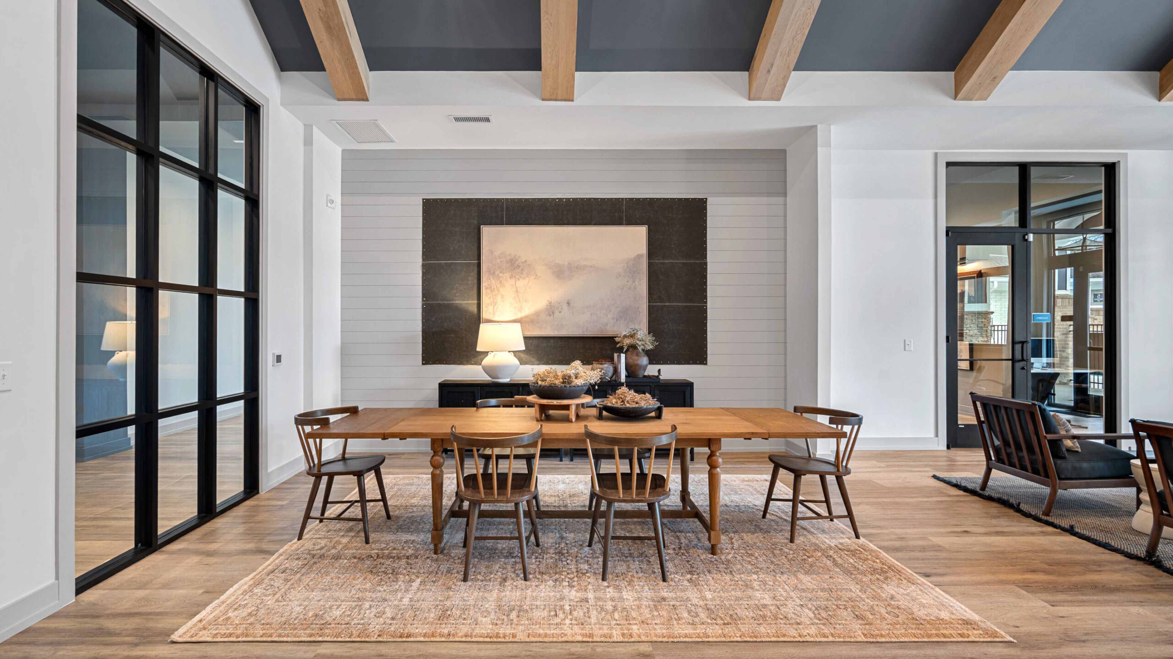 Hawthorne at Holbrook smiling young man relaxing at home and using tablet